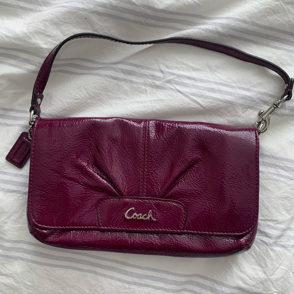 COACH plum wristlet